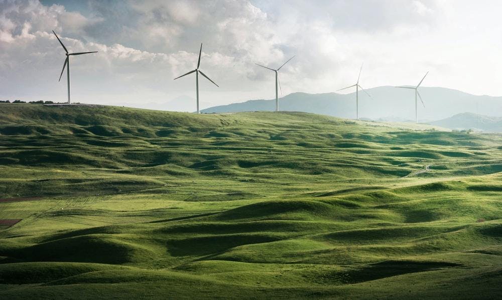 Green hills with wind turbines