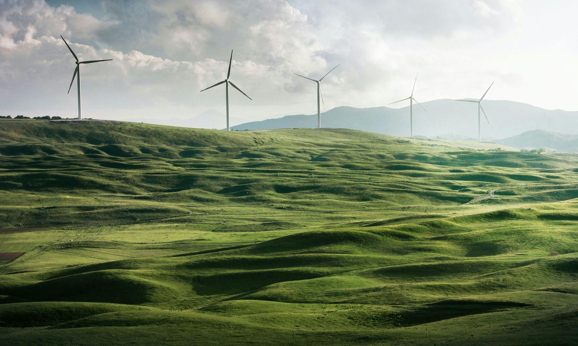 Green hills with wind turbines