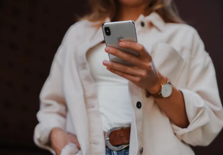 Woman checks phone